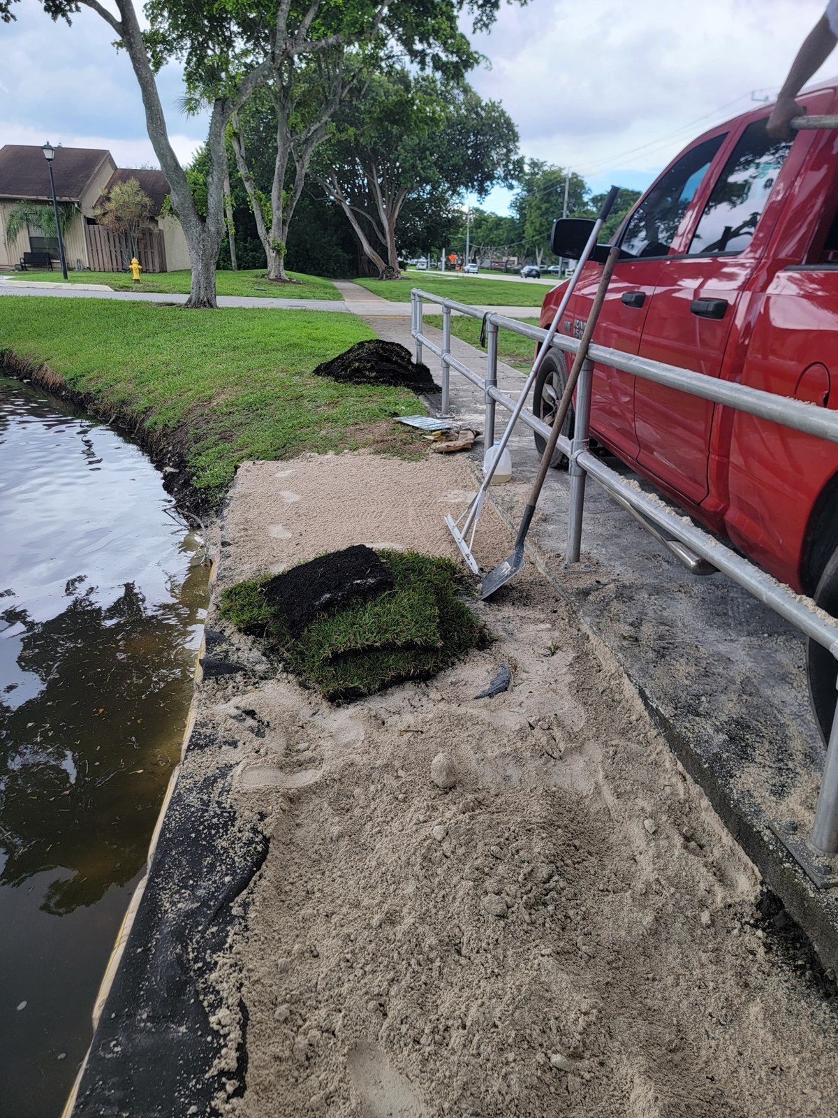 Backfilling with sand — rip rap cement bag retaining wall
