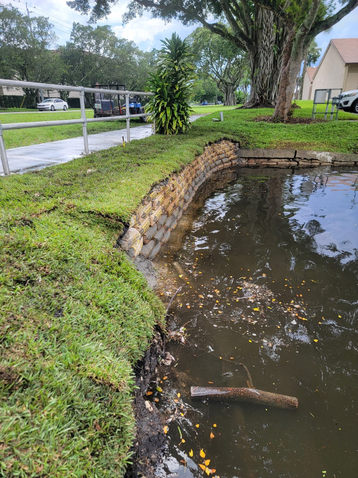 Finished retaining wall — rip rap cement bag retaining wall